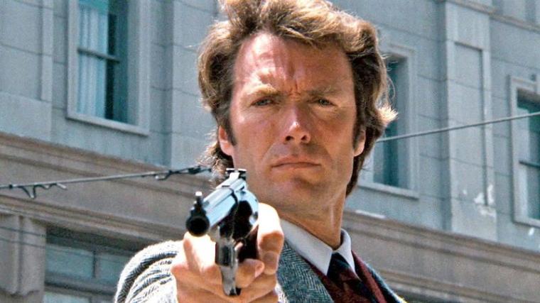 Dirty Harry (Clint Eastwood) aims a gun at his target.