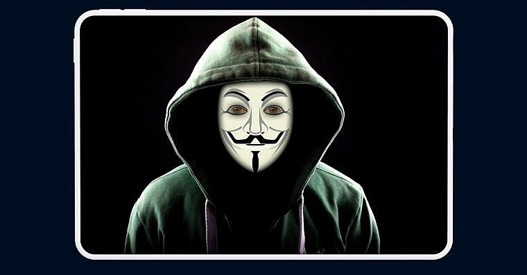 Anonymous person wearing the Guy Fawkes mask mask depicting a pale face with a...